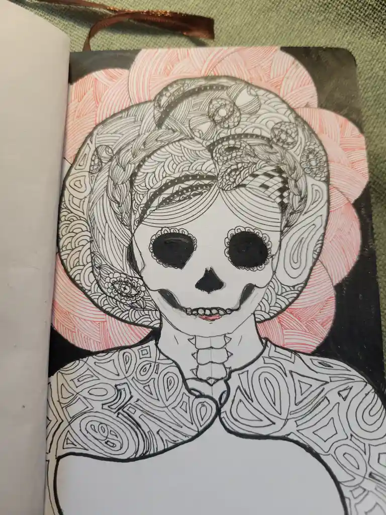 A detailed black-and-white line drawing of a stylized sugar skull with intricate floral and geometric patterns in its hair…