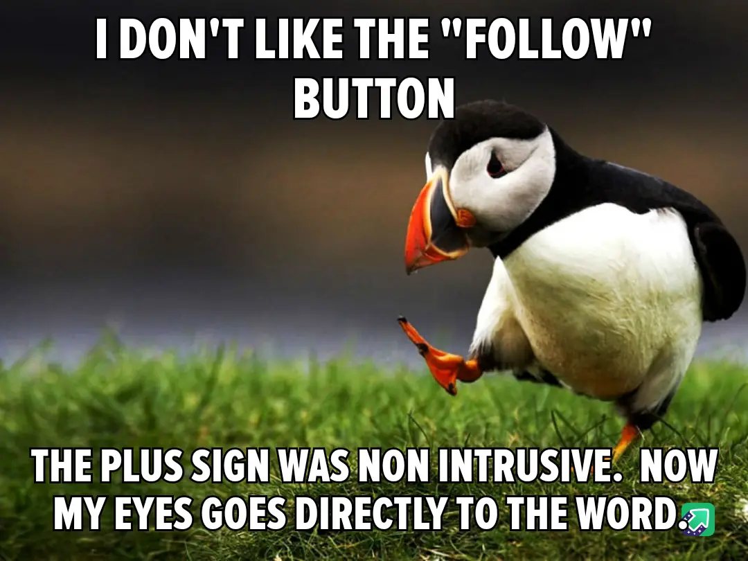 A close-up photo of a puffin standing on green grass, looking down and to the side with a slightly annoyed or disapproving…
