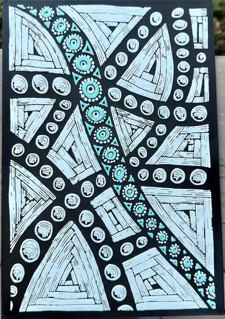 A black canvas features a symmetrical, intricate pattern of raised white and light blue geometric shapes, including…