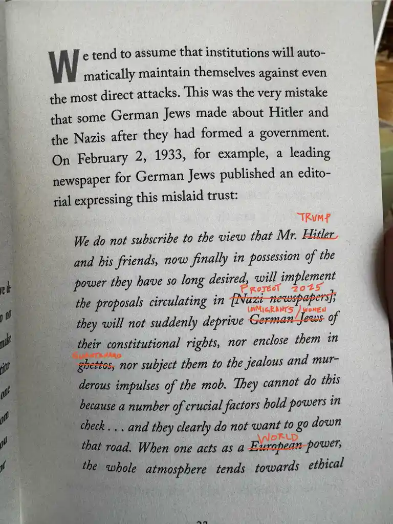 A book page showing a historical editorial from 1933, where words like 'Hitler', '[Nazi newspapers]', 'German Jews'…