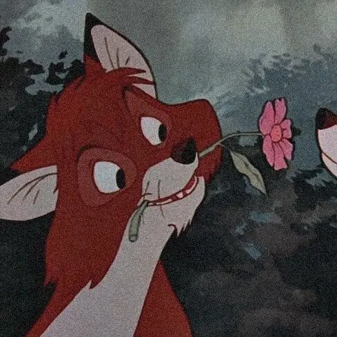 A cartoon fox with wide, startled eyes holds a pink flower by its stem, looking surprised or confused. The fox's mouth is…