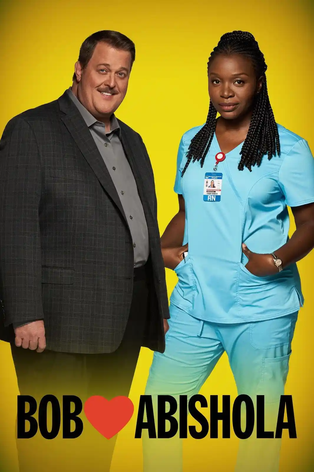 A promotional poster for the TV show 'Bob ❤️ Abishola' featuring a smiling man in a grey plaid suit standing next to a woman…