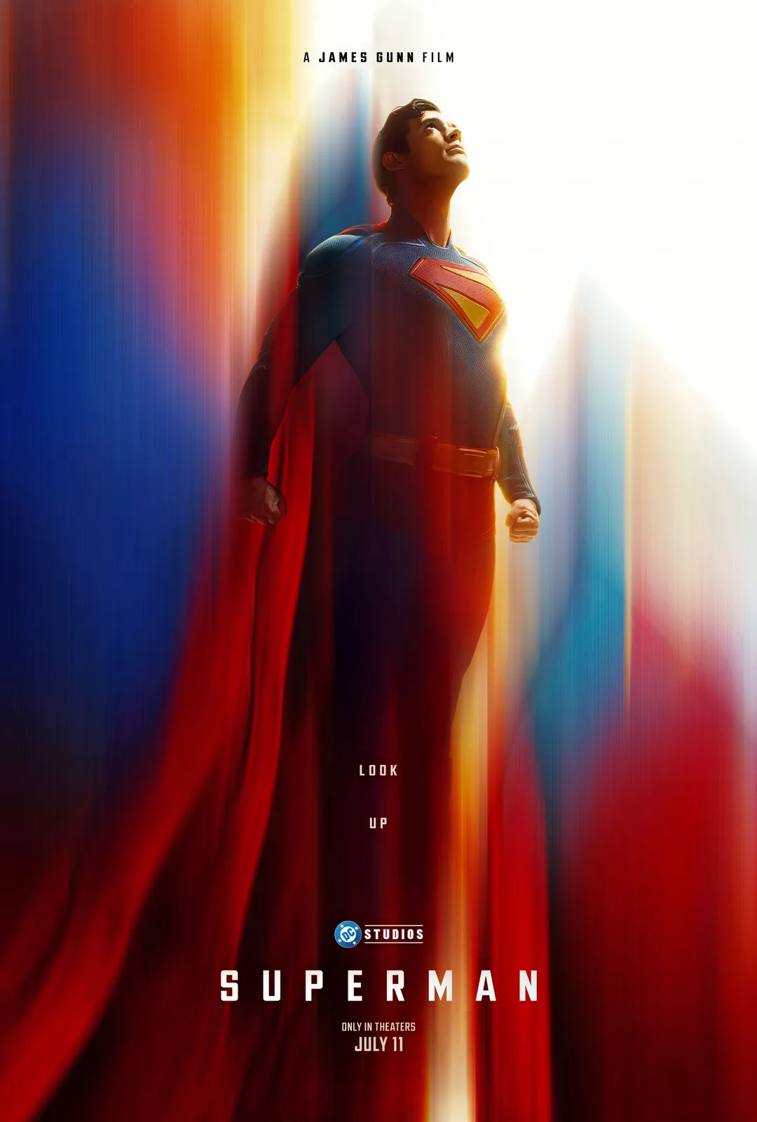 A promotional movie poster for the film 'Superman' directed by James Gunn, featuring the superhero standing with his head…