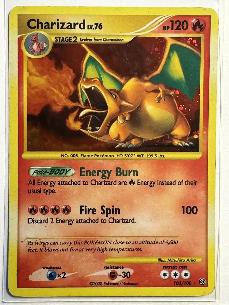 A Pokémon trading card featuring Charizard, a fire-type dragon, roaring with flames. The card's 'Poke-BODY' ability is…