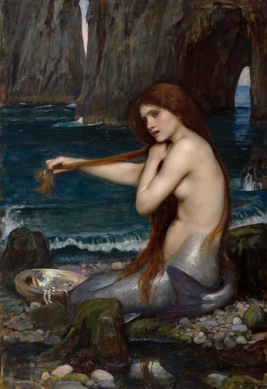 A classical painting depicts a mermaid with long red hair sitting on a rocky shore, her silver fish tail visible, as she…