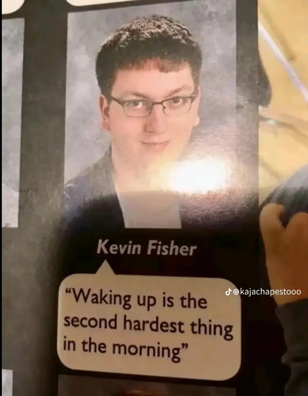 A printed school yearbook-style photo of a young man named Kevin Fisher wearing glasses and a dark shirt, with a speech…