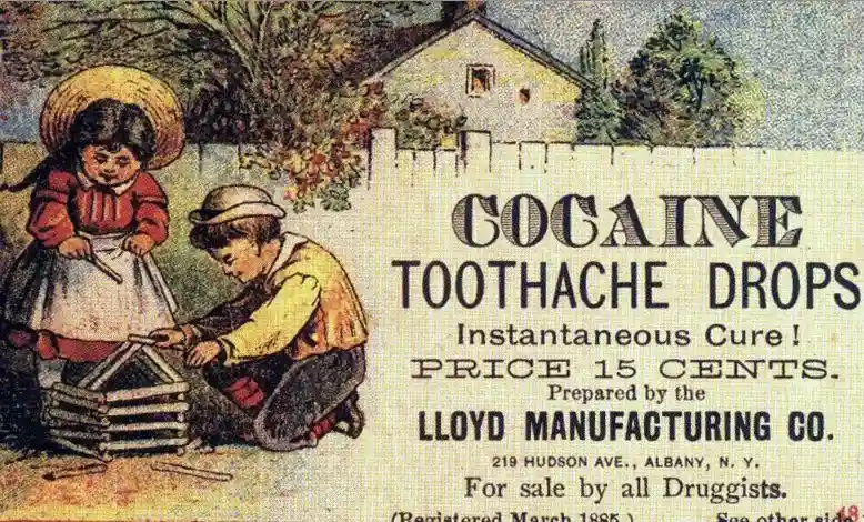An old-fashioned, sepia-toned advertisement depicts two children playing with a stack of blocks while a house and fence are…