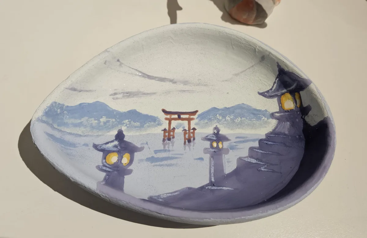 Just finished painting this masterpiece at the pottery studio yesterday, and I can't wait to see how it turns out after firing!