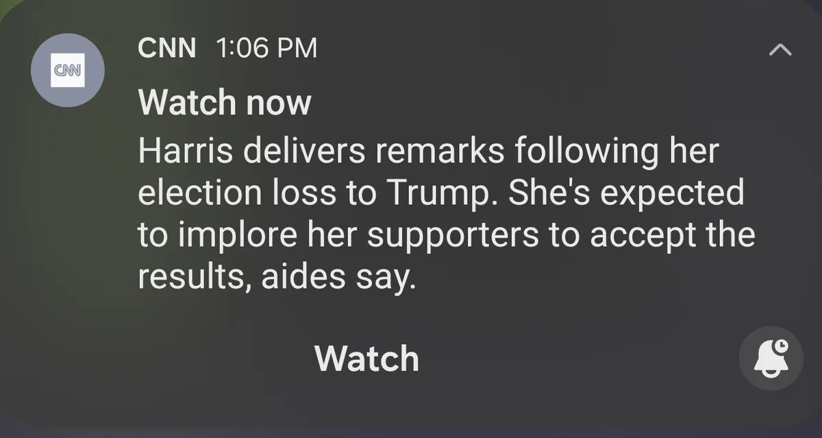 A screenshot of a CNN notification at 1:06 PM, showing a 'Watch now' alert about Kamala Harris delivering remarks after…