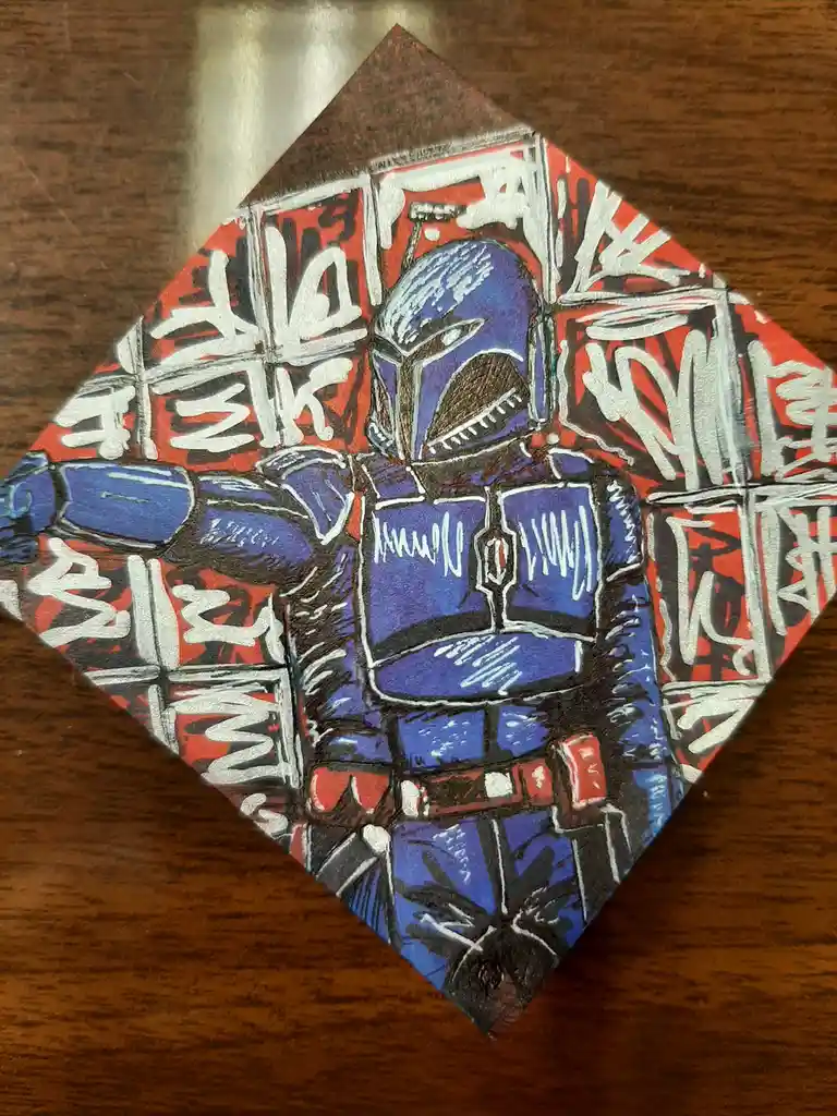 A hand-drawn illustration of the character Boba Fett, depicted in his iconic blue and red armor, is centered on a…
