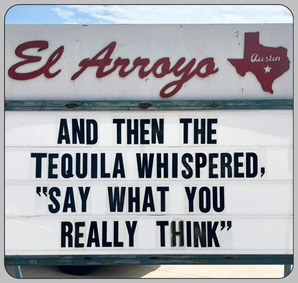 A weathered white marquee sign for 'El Arroyo' in Austin, Texas, displays the text 'AND THEN THE TEQUILA WHISPERED, "SAY…