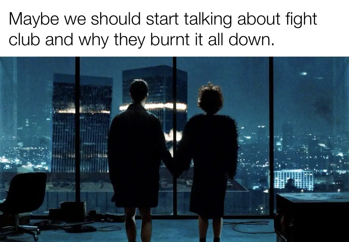 Two silhouetted people stand holding hands in front of a large window overlooking a city at night. The overlaid text reads…