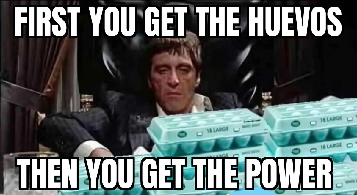 A still image of the character Michael Corleone from 'The Godfather' sitting in a chair with stacks of egg cartons in front…