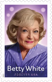 A U.S. postage stamp featuring a portrait of actress Betty White, smiling warmly in a purple outfit against a purple…