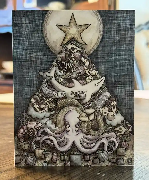 A hand-drawn illustration depicts a Christmas tree made of ocean creatures, topped with a starfish and surrounded by…