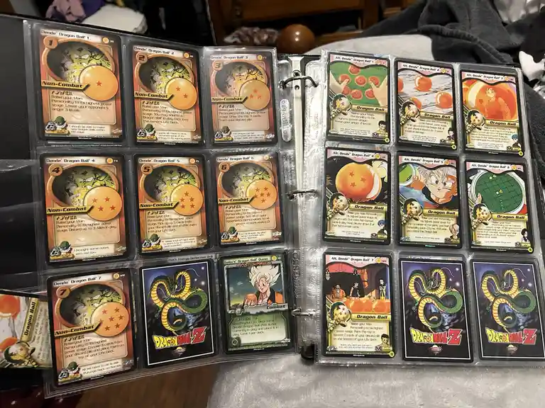 A binder page displays Dragon Ball Z trading cards, including 'Dende Dragon Ball' variants 1-7, 'Alt. Dende Dragon Ball'…