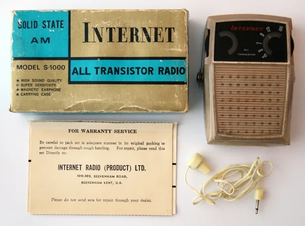 An old-fashioned transistor radio and its box are shown, with the word 'INTERNET' prominently displayed on both the device's…