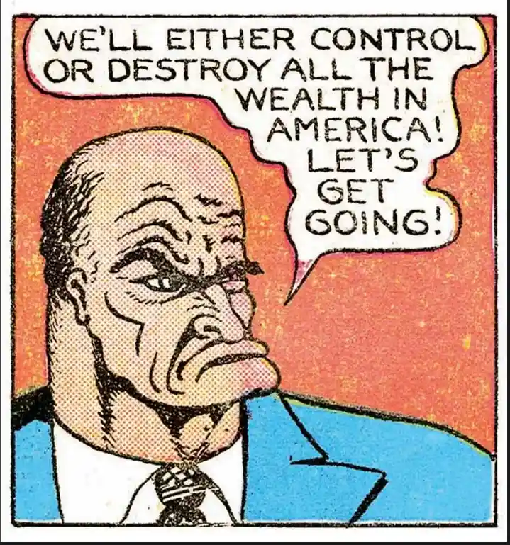 A comic book panel shows a bald, stern-looking man in a blue suit and tie with a speech bubble. The text in the bubble reads…