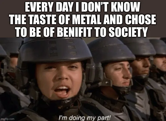 A still from the movie 'The Matrix' shows a group of soldiers in dark helmets and armor, with the woman in the foreground…