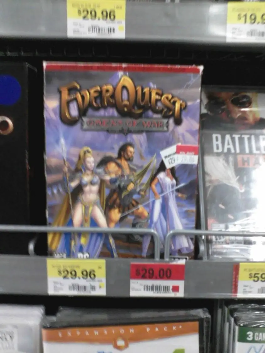 A store shelf displays a video game box for 'EverQuest: Gates of War' priced at $29.96, with a red sticker showing a…
