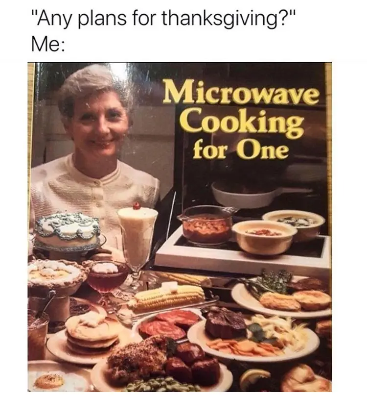An image of a vintage cookbook cover titled 'Microwave Cooking for One' featuring a smiling older woman surrounded by an…