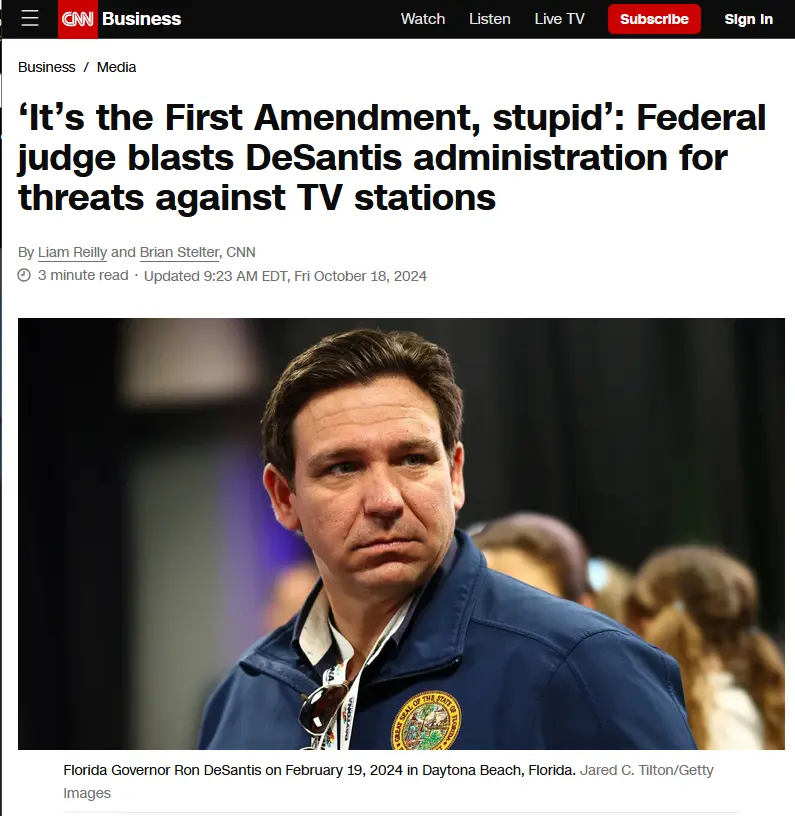 A screenshot of a CNN Business article shows a photo of Florida Governor Ron DeSantis looking serious, with the overlaid…