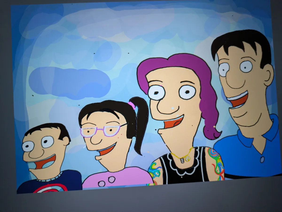 The image shows four cartoon characters from the show 'King of the Hill' standing side by side against a blue sky with…