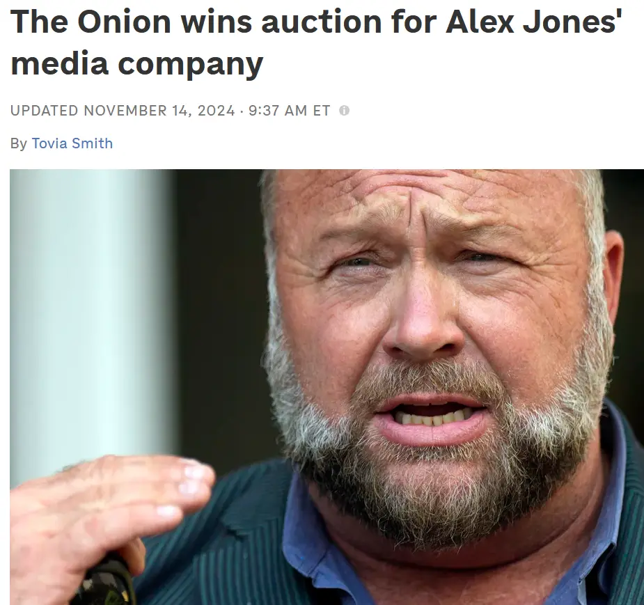 A close-up photo of Alex Jones with a distressed, tearful expression, overlaid with the headline 'The Onion wins auction for…