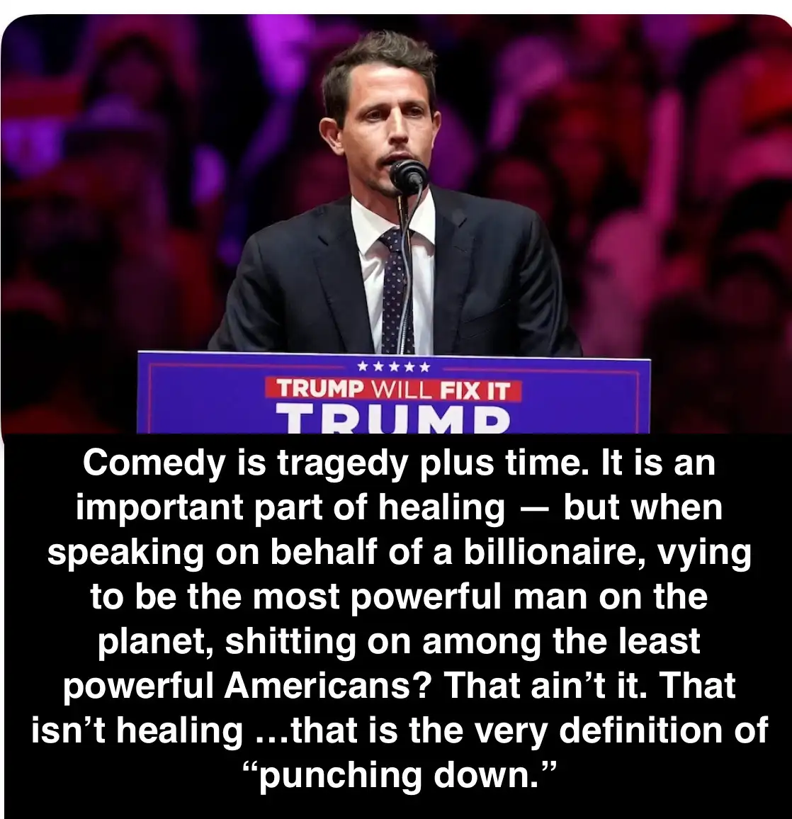 A man in a suit stands at a podium with a sign reading 'TRUMP WILL FIX IT TRUMP'. Overlaid text critiques comedy as…
