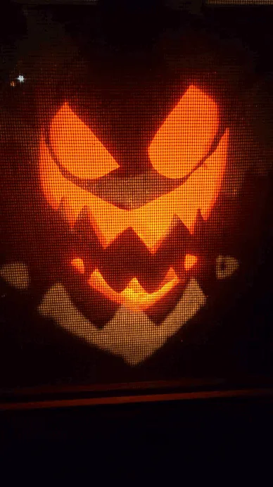 The image displays six panels arranged in two rows of three, each showing a glowing jack-o'-lantern with a menacing, jagged…