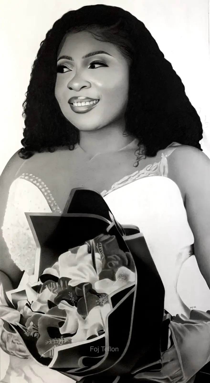 A black-and-white portrait of a smiling woman with curly hair, wearing a white top and holding a bouquet of flowers wrapped…