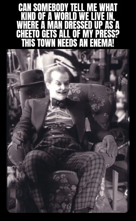 A black-and-white photo shows the Joker from The Dark Knight sitting in a chair, looking annoyed. He wears a suit, bowtie…