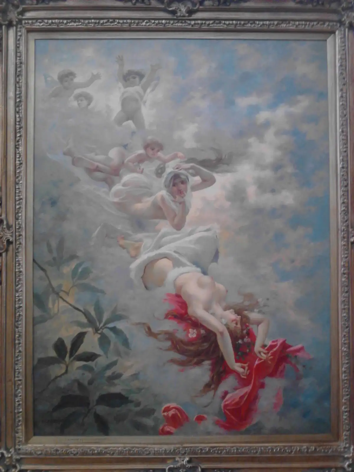 A classical painting depicts a woman in a red dress falling through clouds, surrounded by cherubs, with a serene woman in…