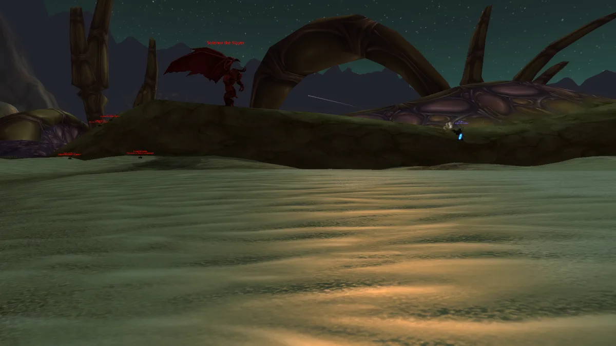 A screenshot from the game World of Warcraft shows a small player character standing on a distant hill, facing a large red…