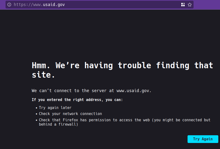 A screenshot of a Firefox browser displaying a connection error page for the website www.usaid.gov. The page has a dark…