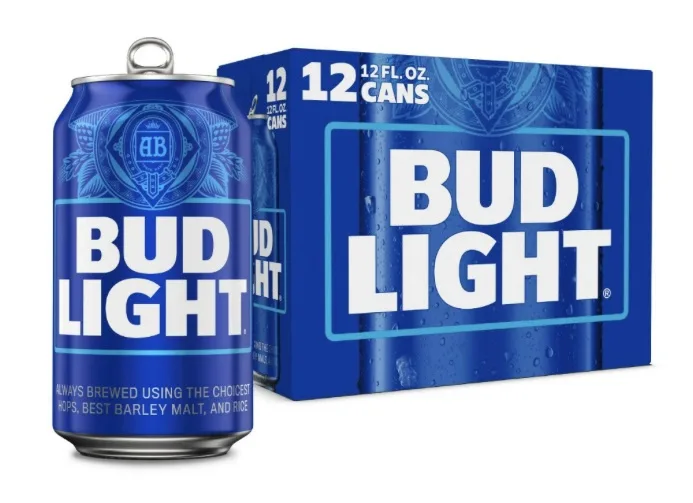 A blue Bud Light beer can sits next to a matching blue 12-pack box, both featuring the brand name in large white letters…