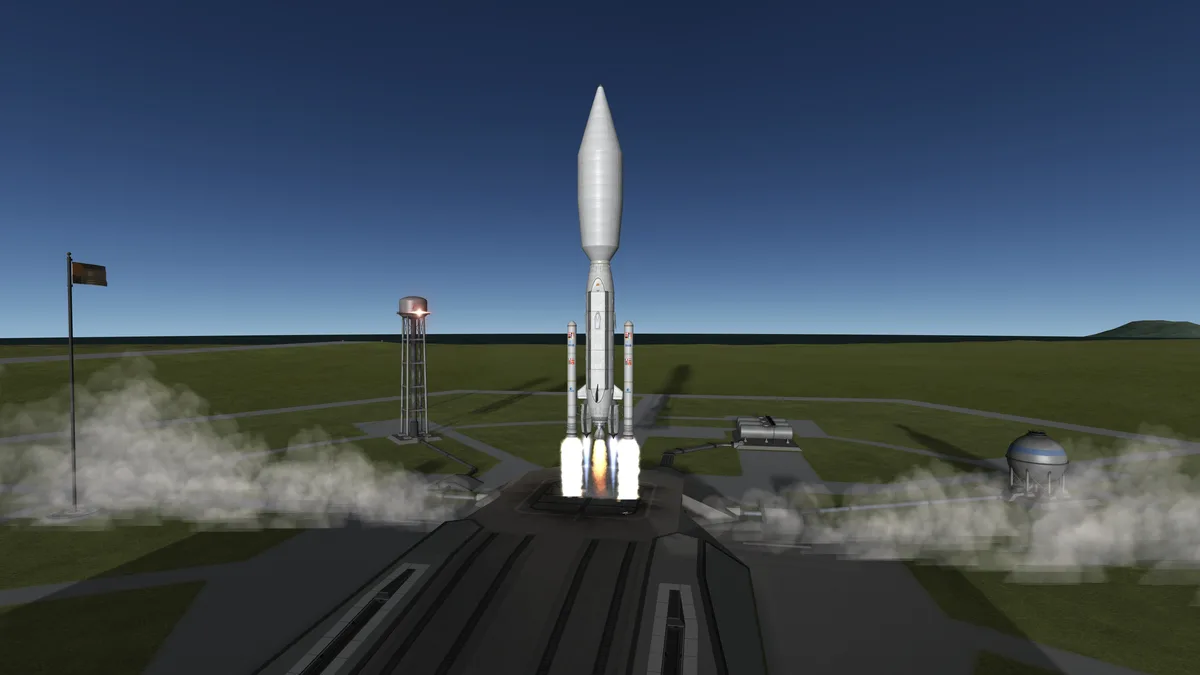 A computer-generated image shows a large white rocket on a launchpad, engines firing with bright flames and smoke billowing…