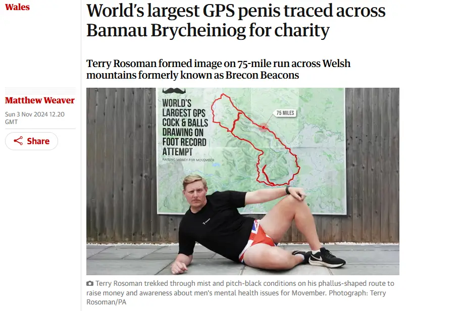 A man in running shorts and a black t-shirt sits on the ground in front of a map displaying a red 75-mile route shaped like…