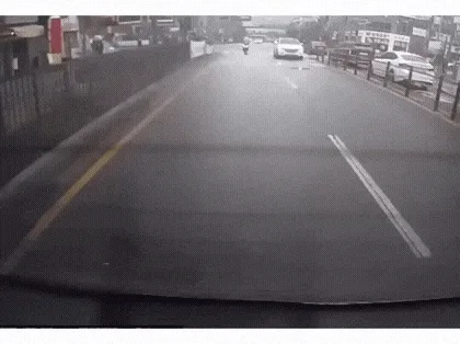 A six-panel dashcam sequence shows a scooter rider approaching a car, getting hit, falling, and then getting up and walking…