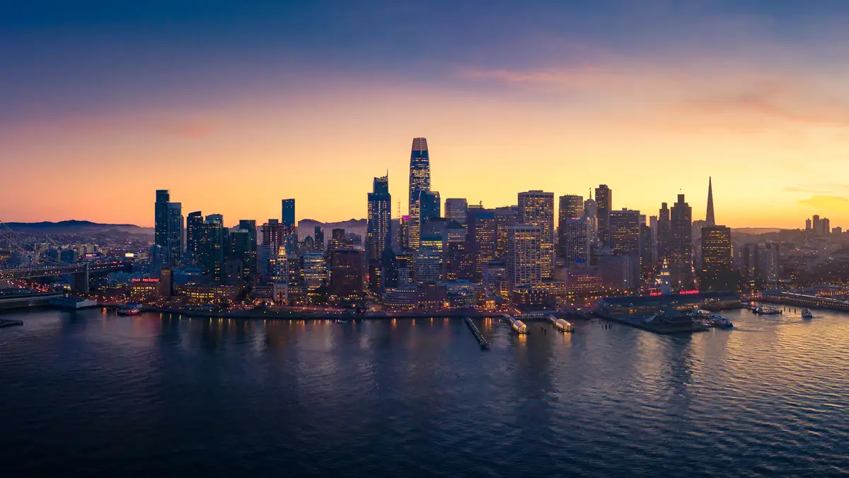 In this twilight scene, San Francisco's skyline is transformed by the 2018 addition of Salesforce Tower, the city's new…