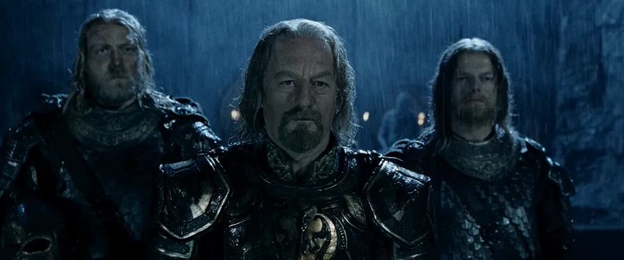 The image displays three identical panels of three men in dark armor standing in a dim, rainy, stone-walled setting. The top…