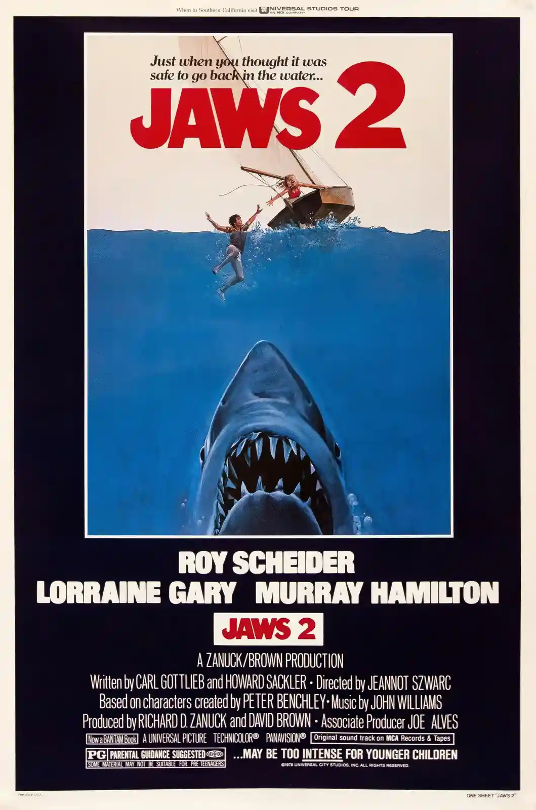 This is the original movie poster for 'Jaws 2' (1978), featuring a large shark with its mouth open rising from deep blue…