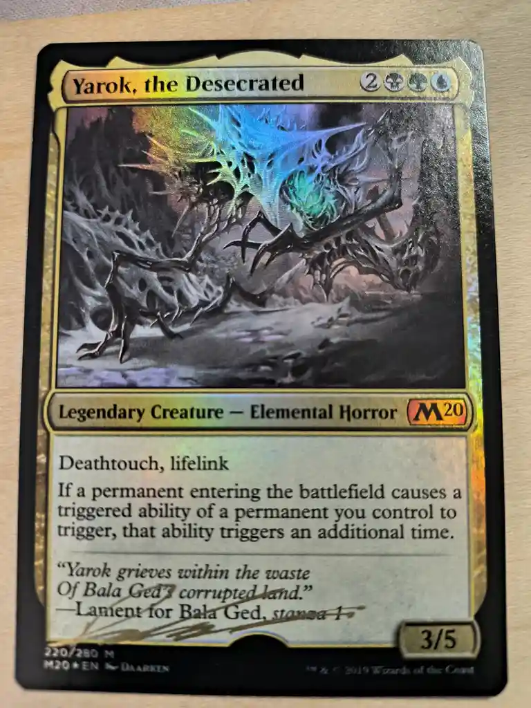 A Magic: The Gathering card for 'Yarok, the Desecrated' shows a monstrous, multi-limbed elemental horror with glowing blue…