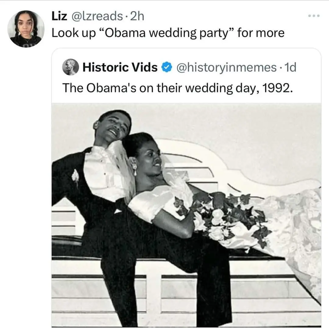 A black-and-white photo shows Barack and Michelle Obama posing on a bench on their wedding day in 1992, both smiling and…