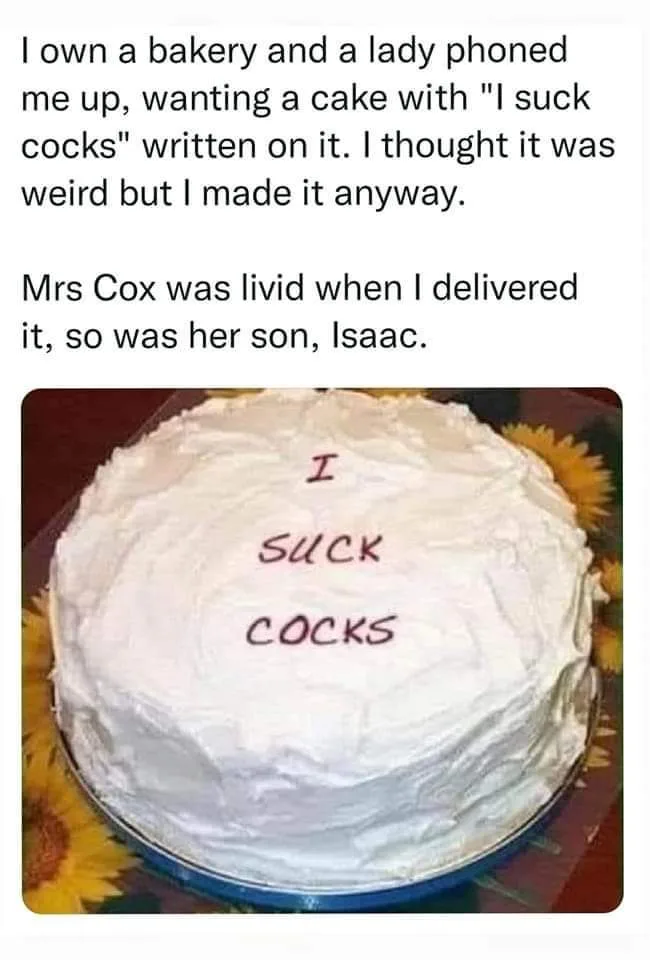 A round white frosted cake with the words "I SUCK COCKS" written in red icing. The cake sits on a blue plate with sunflowers…