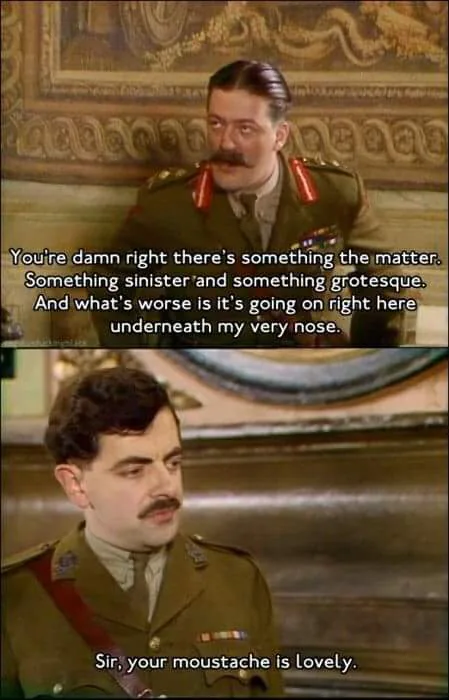 The meme features two panels from a movie. The top panel shows a man in a military uniform with a mustache, looking…