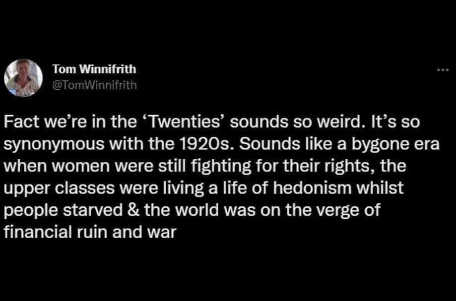 A screenshot of a tweet by Tom Winnifrith, with white text on a black background, expressing the oddity of calling the…