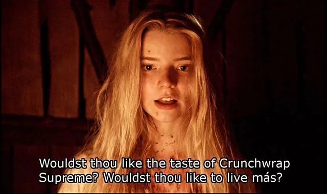 A still from a movie shows a young woman with long blonde hair and a distressed expression, her neck and shoulders covered…