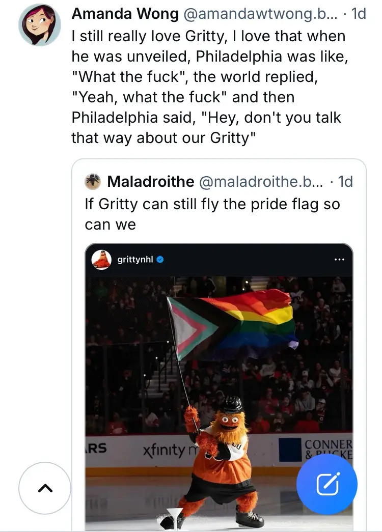 A screenshot of a tweet by @grittynhl showing the orange mascot Gritty holding a rainbow pride flag on an ice rink with…