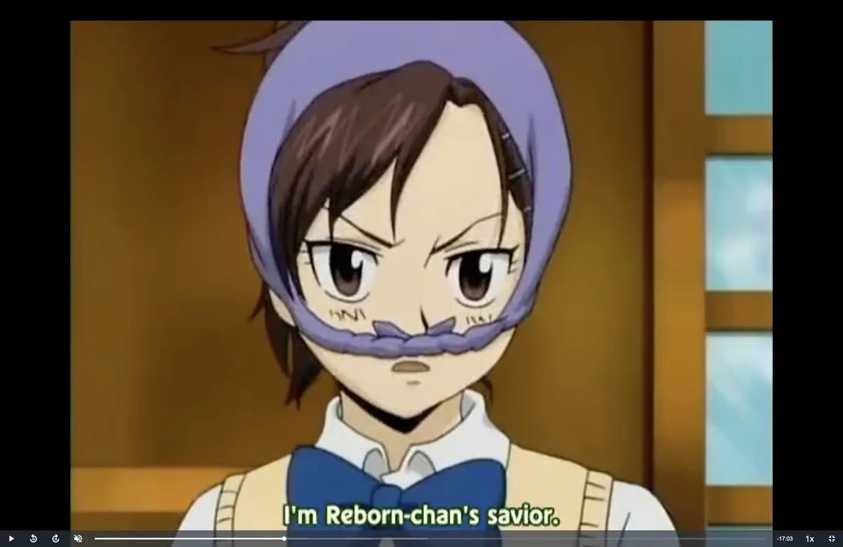 An anime character with brown hair and a purple headband has a purple mustache drawn on their face, looking serious. The…